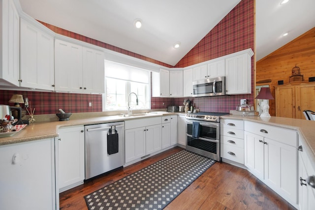 7326 State Route 19 Unit 3, Lots 1-2, Mount Gilead, OH 43338 - kitchen with appliances with stainless steel finishes, a sink, lofted ceiling, white cabinets, and dark wood-type flooring