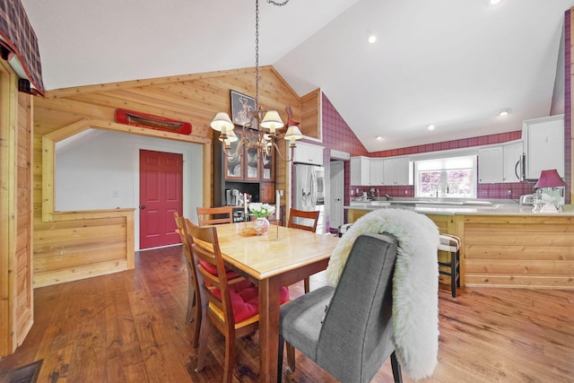 7326 State Route 19 Unit 3, Lots 1-2, Mount Gilead, OH 43338 - dining room with a chandelier, wood walls, wood finished floors, high vaulted ceiling, and recessed lighting
