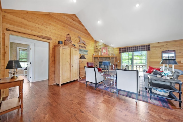 7326 State Route 19 Unit 3, Lots 1-2, Mount Gilead, OH 43338 - living room with wood walls, wood finished floors, high vaulted ceiling, and recessed lighting