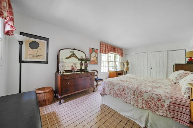 7326 State Route 19 Unit 3, Lots 1-2, Mount Gilead, OH 43338 - bedroom with multiple closets and tile patterned flooring