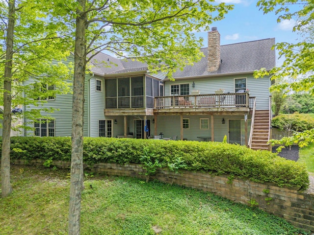 7326 State Route 19 Unit 3, Lots 1-2, Mount Gilead, OH 43338 - back of house with stairs, a sunroom, a wooden deck, a chimney, and a yard