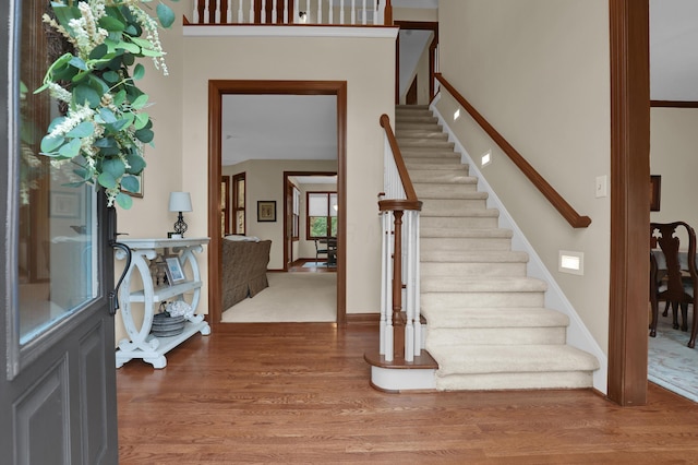 7832 Windsor Ave NW, Canal Winchester, OH 43110 - entryway with wood finished floors, stairs, and baseboards