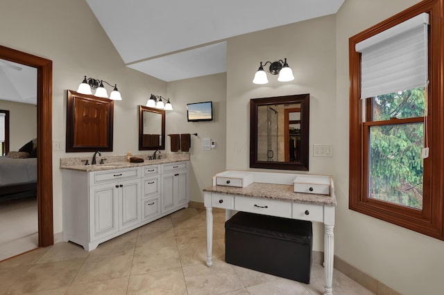 7832 Windsor Ave NW, Canal Winchester, OH 43110 - full bathroom featuring baseboards, connected bathroom, and double vanity