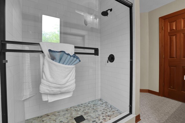 7832 Windsor Ave NW, Canal Winchester, OH 43110 - bathroom with a shower stall and baseboards