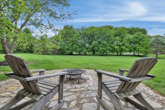 7832 Windsor Ave NW, Canal Winchester, OH 43110 - view of patio / terrace featuring a fire pit