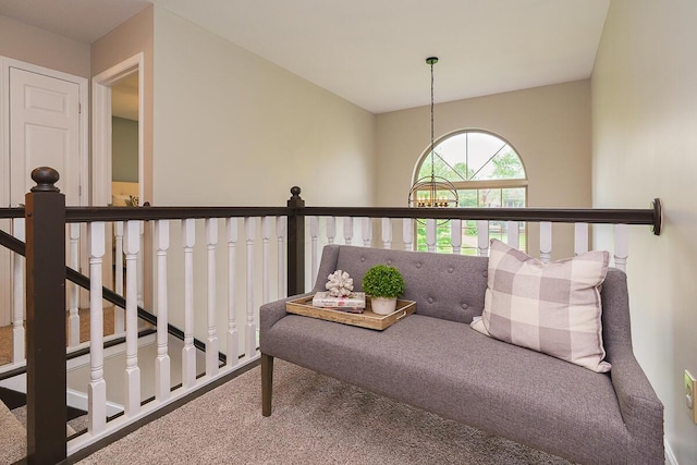 sitting room with carpet floors