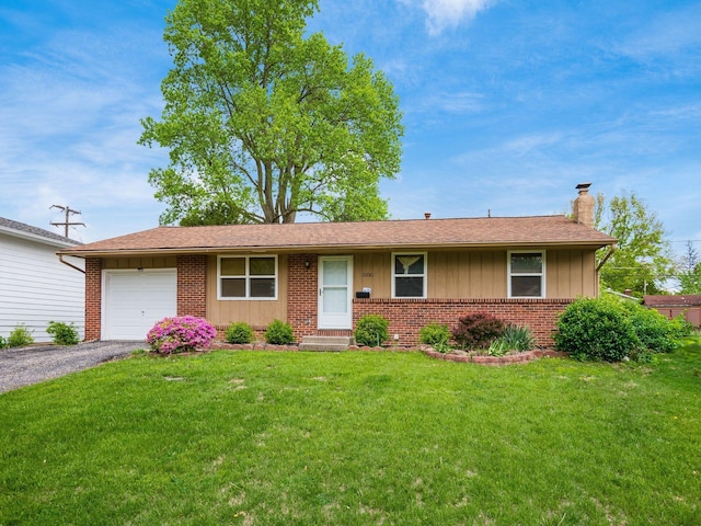 5030 Holbrook Dr, Columbus, OH 43232 - ranch-style home featuring a chimney, brick siding, an attached garage, board and batten siding, and asphalt driveway