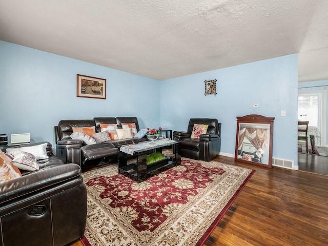 5030 Holbrook Dr, Columbus, OH 43232 - living room with wood finished floors and a textured ceiling