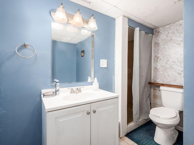 5030 Holbrook Dr, Columbus, OH 43232 - full bath with toilet, vanity, tile patterned floors, and curtained shower
