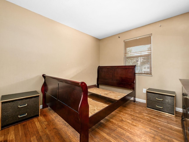 5030 Holbrook Dr, Columbus, OH 43232 - bedroom with baseboards and hardwood / wood-style flooring