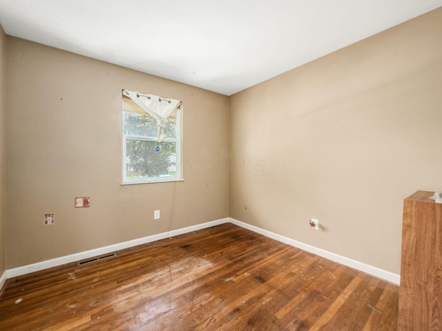 5030 Holbrook Dr, Columbus, OH 43232 - unfurnished room featuring baseboards and hardwood / wood-style floors