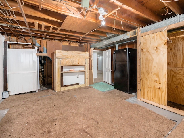 5030 Holbrook Dr, Columbus, OH 43232 - unfinished below grade area featuring freestanding refrigerator