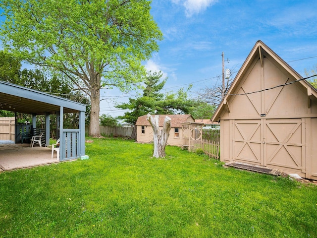 5030 Holbrook Dr, Columbus, OH 43232 - view of yard with an outbuilding and a patio area