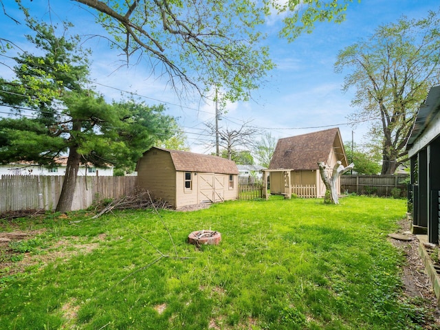 5030 Holbrook Dr, Columbus, OH 43232 - view of yard with a storage unit and an outbuilding