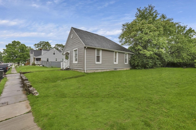 155 N Harris Ave, Columbus, OH 43204 - view of side of property featuring a yard and roof with shingles