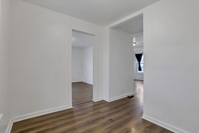 155 N Harris Ave, Columbus, OH 43204 - spare room with dark wood-style flooring and baseboards