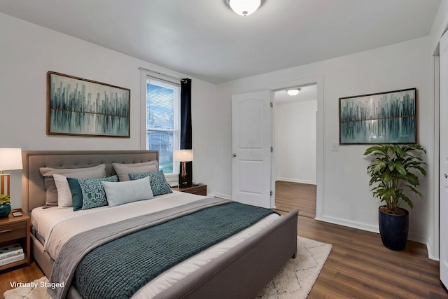 155 N Harris Ave, Columbus, OH 43204 - bedroom with wood finished floors and baseboards