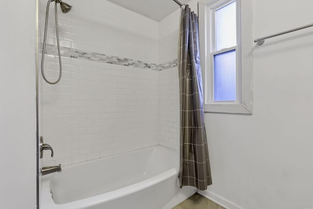 155 N Harris Ave, Columbus, OH 43204 - full bath featuring healthy amount of natural light, shower / bath combo, and baseboards