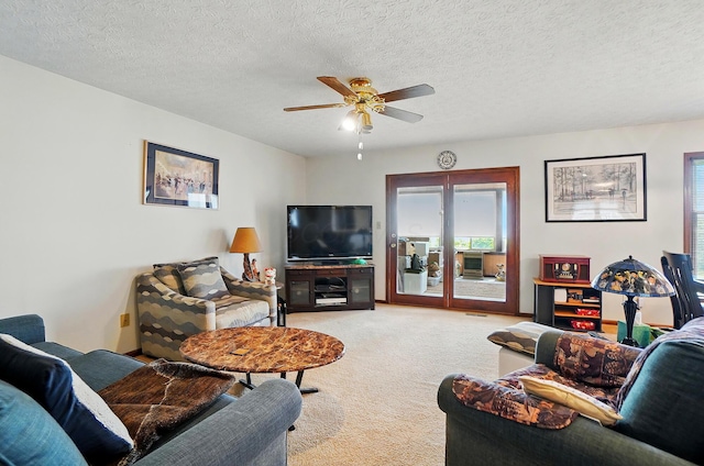 371 Federal Cir, Delaware, OH 43015 - living area featuring a ceiling fan, light colored carpet, and a textured ceiling