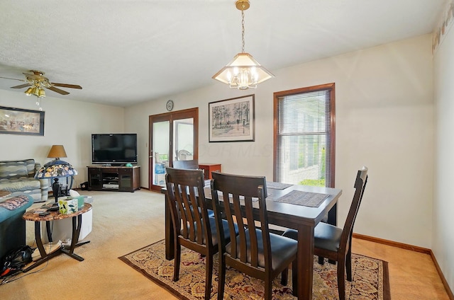 371 Federal Cir, Delaware, OH 43015 - dining room with light colored carpet, plenty of natural light, ceiling fan, and baseboards