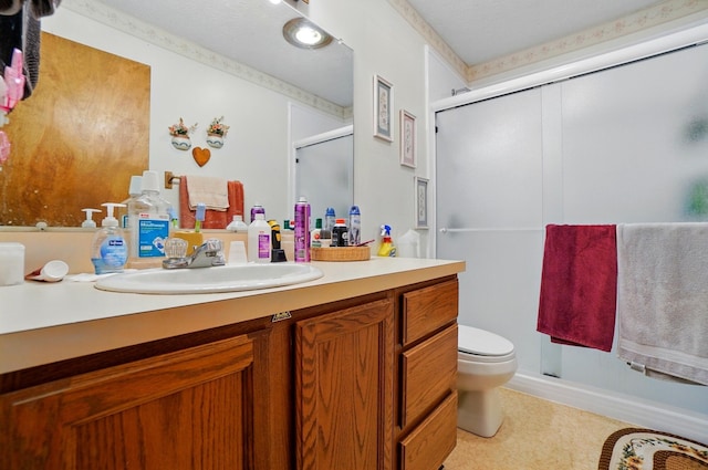 371 Federal Cir, Delaware, OH 43015 - bathroom featuring a shower stall, vanity, and toilet