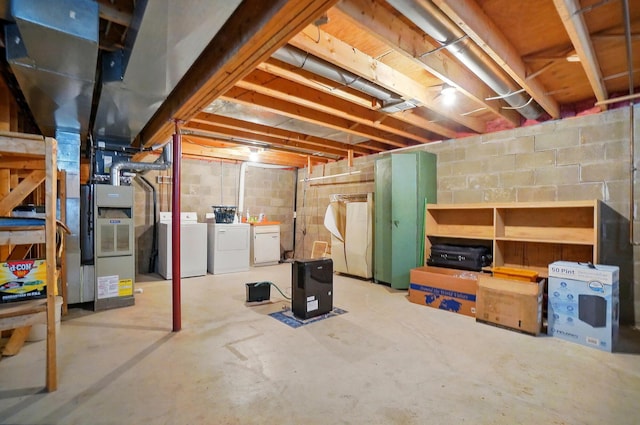 371 Federal Cir, Delaware, OH 43015 - unfinished below grade area with separate washer and dryer, concrete block wall, and heating unit