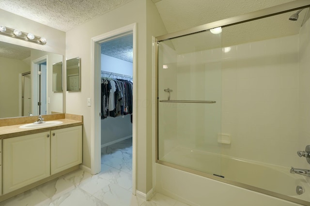 4115 Aumbrey Ct, New Albany, OH 43054 - full bath with marble finish floors, a textured ceiling, enclosed tub / shower combo, vanity, and a spacious closet