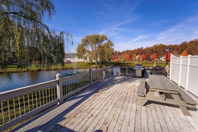 4115 Aumbrey Ct, New Albany, OH 43054 - wooden terrace with a water view, outdoor dining space, and view of wooded area