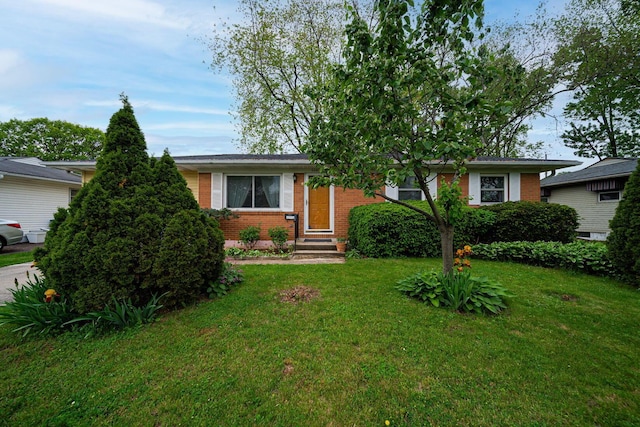 6241 Faircrest Rd, Columbus, OH 43229 - view of front of property featuring brick siding, a front lawn, and entry steps