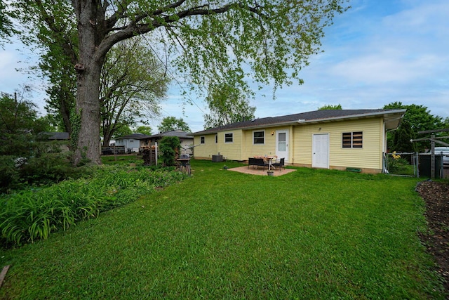 6241 Faircrest Rd, Columbus, OH 43229 - back of house featuring a patio and a gate