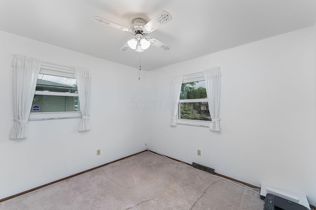 6241 Faircrest Rd, Columbus, OH 43229 - spare room with ceiling fan, carpet floors, and baseboards