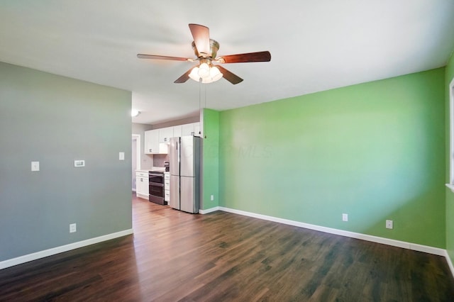 820 N Walnut St, Baltimore, OH 43105 - empty room with ceiling fan, baseboards, and dark wood-style floors