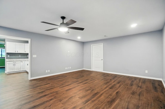 820 N Walnut St, Baltimore, OH 43105 - unfurnished room featuring ceiling fan, baseboards, dark wood-style floors, and recessed lighting