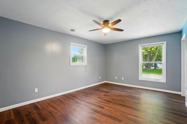 820 N Walnut St, Baltimore, OH 43105 - empty room with healthy amount of natural light, ceiling fan, baseboards, and dark wood-type flooring