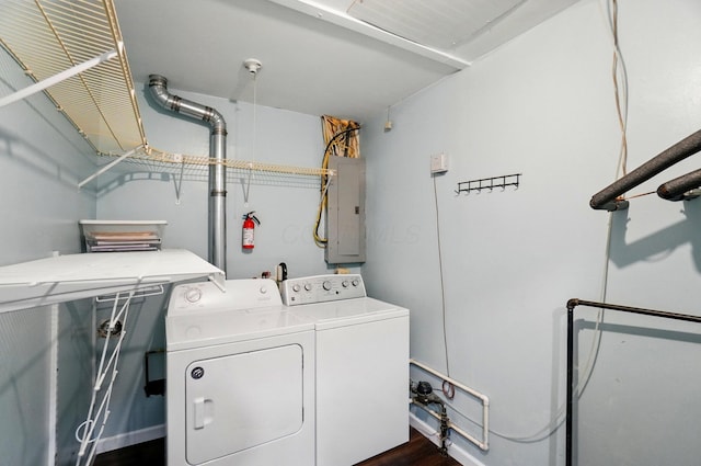 820 N Walnut St, Baltimore, OH 43105 - laundry area featuring washer and dryer, electric panel, and dark wood-style flooring