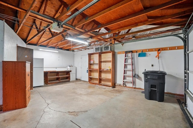 820 N Walnut St, Baltimore, OH 43105 - basement with freestanding refrigerator and a garage
