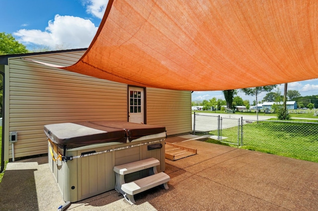 820 N Walnut St, Baltimore, OH 43105 - view of patio / terrace with a hot tub and a gate