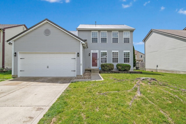 view of front of property featuring a garage, concrete driveway, a front yard, and metal roof
