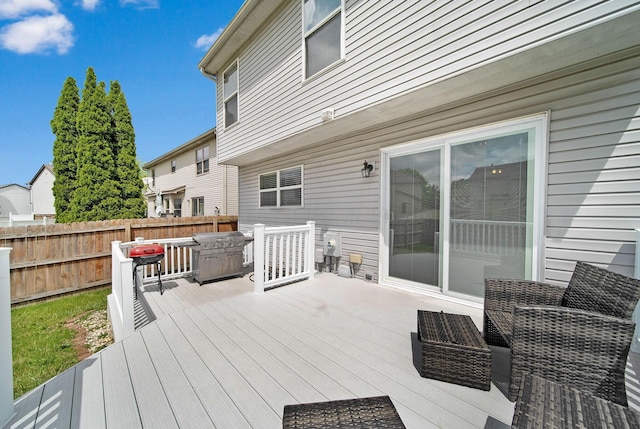 wooden deck featuring fence