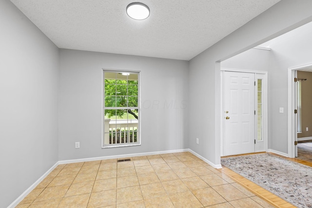 1980 Maxwell Ave, Lewis Center, OH 43035 - unfurnished room featuring a textured ceiling and baseboards