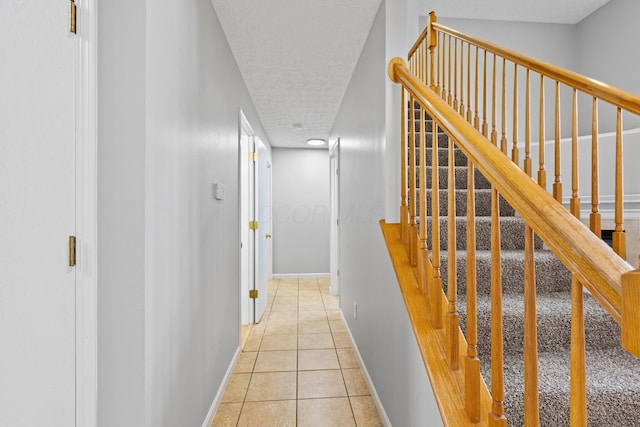 1980 Maxwell Ave, Lewis Center, OH 43035 - hall with tile patterned floors, baseboards, and a textured ceiling