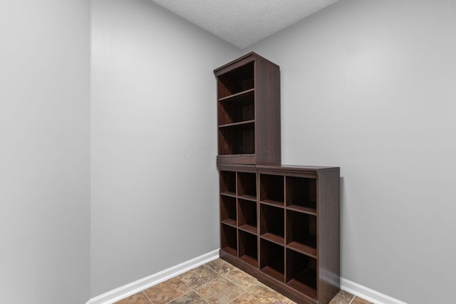 1980 Maxwell Ave, Lewis Center, OH 43035 - detailed view of baseboards and a textured ceiling