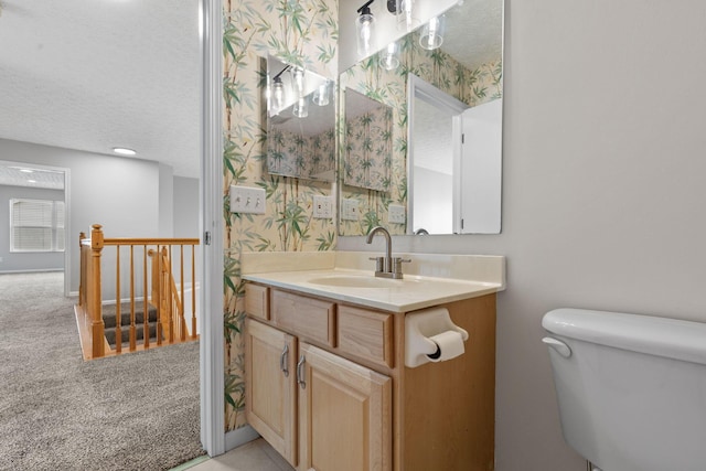 1980 Maxwell Ave, Lewis Center, OH 43035 - half bath featuring toilet, vanity, and a textured ceiling