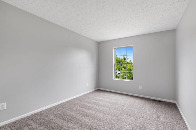 1980 Maxwell Ave, Lewis Center, OH 43035 - carpeted spare room with a textured ceiling and baseboards