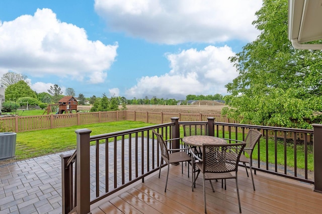 1980 Maxwell Ave, Lewis Center, OH 43035 - wooden deck featuring outdoor dining space, central AC, and a playground