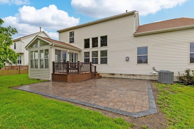 1980 Maxwell Ave, Lewis Center, OH 43035 - rear view of property with a patio, a sunroom, central AC, and a wooden deck
