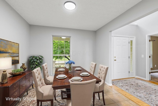 1980 Maxwell Ave, Lewis Center, OH 43035 - dining space featuring baseboards and a textured ceiling