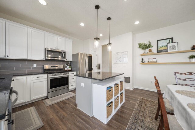 136 Bigelow Dr, Johnstown, OH 43031 - kitchen with appliances with stainless steel finishes, open shelves, white cabinets, dark wood-style floors, and recessed lighting