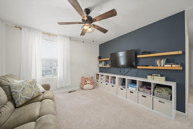 136 Bigelow Dr, Johnstown, OH 43031 - carpeted living area with a ceiling fan and baseboards