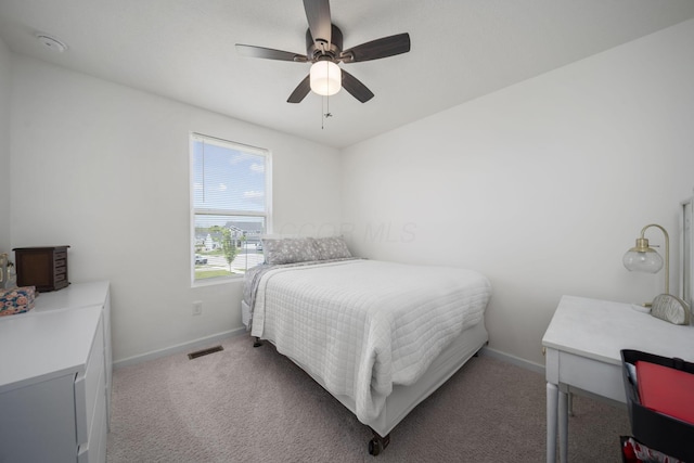 136 Bigelow Dr, Johnstown, OH 43031 - bedroom featuring baseboards, light carpet, and ceiling fan